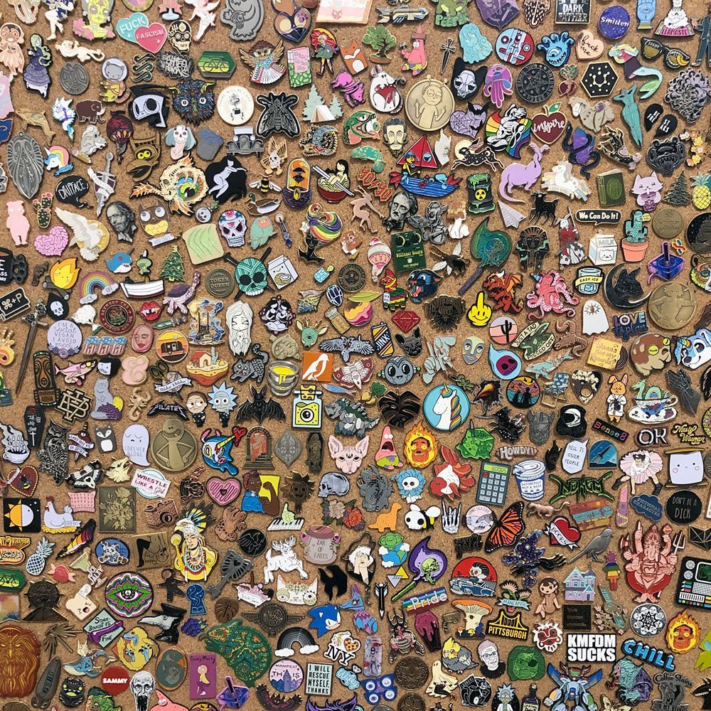 Large collection of colorful custom enamel pins. Make your own enamel pins