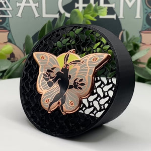 Load video: Hard enamel custom pin buffed flat to a jewelry-quality finish